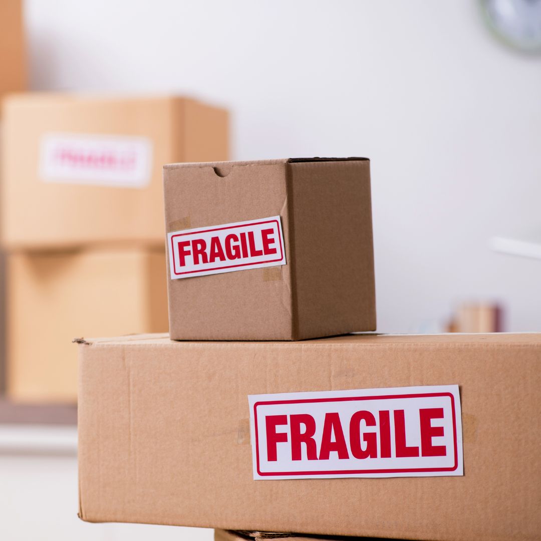 stack of boxes with fragile stickers