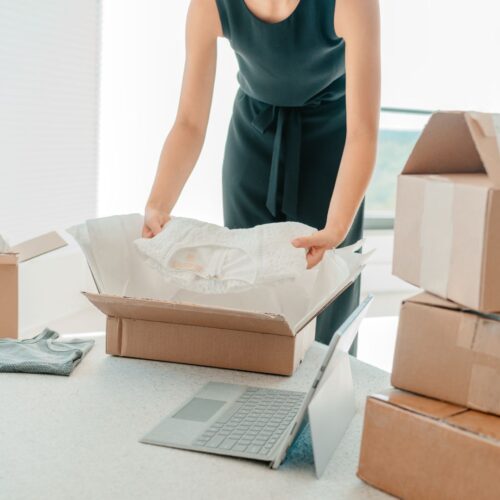 woman packing a box