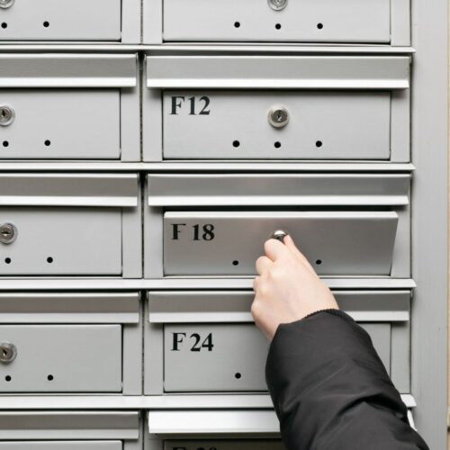 person checking mailbox