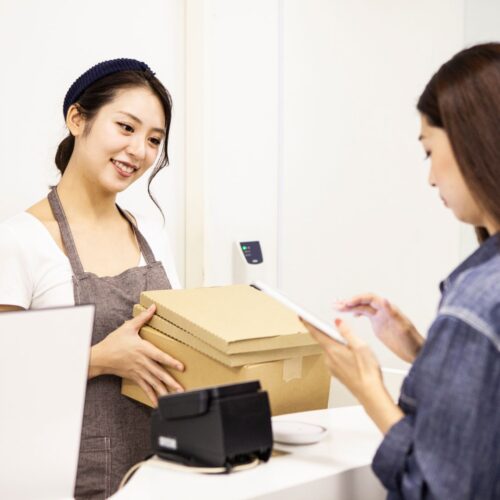 person pickup up packages