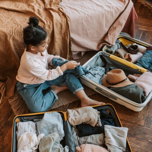 woman packing suitcases